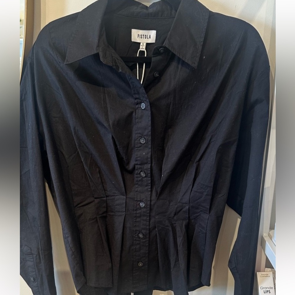 Pistola black button up ruched in the middle.. very flattering on the body